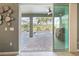 Enjoy this view of the screened in patio, gorgeous pool, and meticulous backyard landscaping at 7812 Birdie Bend Way, Sarasota, FL 34241