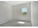 Cozy bedroom with a window and neutral carpeting at 12440 Meribel St, Venice, FL 34293