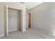Bright bedroom features plush carpet and a closet for storage at 12440 Meribel St, Venice, FL 34293