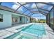 Beautiful pool and deck area with direct access to the kitchen at 12440 Meribel St, Venice, FL 34293