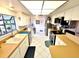 Bright kitchen features white cabinets, modern appliances, and lots of countertop space at 1407 Willow Oak Cir, Bradenton, FL 34209