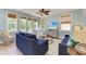 Comfortable living room offers lots of natural light and leads to a large balcony at 312 61St St # A, Holmes Beach, FL 34217