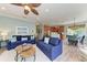 Inviting living room boasts hardwood floors, ceiling fan and views of the dining and kitchen areas at 312 61St St # A, Holmes Beach, FL 34217
