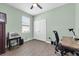 This home office is well-lit and features a closet and an exterior window at 5718 Broad River Run, Ellenton, FL 34222