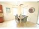 Cozy dining area featuring a ceiling fan, and large window for natural light at 5718 Broad River Run, Ellenton, FL 34222