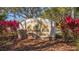 Elegant stone and stucco community sign reading 