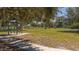 Well-maintained fenced dog park equipped with agility obstacles and benches for owners' enjoyment at 6373 Royal Tern Cir, Lakewood Ranch, FL 34202