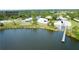 Overhead perspective showcases the community boat ramp, park, and adjacent waterways, perfect for boating enthusiasts at 9464 St Marys Ct, Port Charlotte, FL 33981