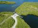 Aerial view of a boat lock and dock on the water surrounded by dense green vegetation at 9464 St Marys Ct, Port Charlotte, FL 33981