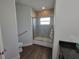 Bathroom featuring an accessible glass-enclosed shower and modern fixtures at 9464 St Marys Ct, Port Charlotte, FL 33981