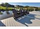 Dock seating overlooking river under a sunny sky at 9464 St Marys Ct, Port Charlotte, FL 33981