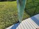 Dock post with green patina on dock near grass at 9464 St Marys Ct, Port Charlotte, FL 33981