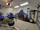 Garage with watercraft, storage, and epoxy floor at 9464 St Marys Ct, Port Charlotte, FL 33981