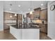 Modern kitchen features granite countertops, stainless steel appliances, and custom cabinetry at 9464 St Marys Ct, Port Charlotte, FL 33981