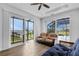 Relaxing screened lanai featuring a lake view, pool, and plenty of space for outdoor furniture at 9464 St Marys Ct, Port Charlotte, FL 33981