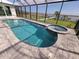 Beautiful screened-in pool and spa with lovely views of the water at 9464 St Marys Ct, Port Charlotte, FL 33981