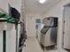 Spacious storage room with epoxy flooring, and fishing pole storage at 9464 St Marys Ct, Port Charlotte, FL 33981