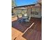 Spacious wooden deck with outdoor seating and a serene backyard view at 4553 Linwood St, Sarasota, FL 34232