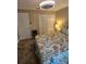 Comfortable bedroom with tropical themed bedding, and an ample closet space at 4553 Linwood St, Sarasota, FL 34232