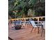 Inviting outdoor deck featuring string lights, a heater, and comfortable seating for relaxing and entertaining at 4553 Linwood St, Sarasota, FL 34232