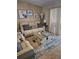 Comfortable living room features a plush sofa, patterned pillows, and neutral decor at 4553 Linwood St, Sarasota, FL 34232