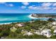 Scenic aerial view of a coastal community with stunning beaches and clear blue waters at 1067 Westway Dr, Sarasota, FL 34236