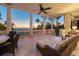 Relaxing outdoor balcony featuring comfortable seating and stunning ocean views at sunset, creating a serene retreat at 1067 Westway Dr, Sarasota, FL 34236