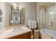 Bathroom featuring a shower and tub combination with a stylish mirror and vanity at 1067 Westway Dr, Sarasota, FL 34236