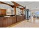 This bathroom features beautiful wooden cabinets, an island tub, and ocean views at 1067 Westway Dr, Sarasota, FL 34236