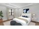 Serene bedroom with a tray ceiling, natural light, and stylish décor accents at 12719 Sunbridge Dr, Venice, FL 34293