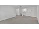 Open bonus room with neutral carpeting, offering versatile living space at 12719 Sunbridge Dr, Venice, FL 34293