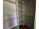 Organized closet features shelving and hanging rods for optimal storage at 18053 Ohara Dr, Port Charlotte, FL 33948