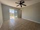 Empty Room with tile flooring and natural lighting at 18053 Ohara Dr, Port Charlotte, FL 33948