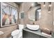 Modern bathroom with unique vessel sink, stylish mirror, and contemporary fixtures at 2149 Hyde Park St, Sarasota, FL 34239
