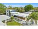 Stunning modern home featuring clean lines, wood accents, meticulous landscaping, and an inviting open design at 2149 Hyde Park St, Sarasota, FL 34239
