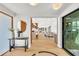 Home foyer with modern decor and open concept into the kitchen and dining area at 2149 Hyde Park St, Sarasota, FL 34239