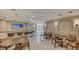 Entertaining space featuring a bar and dining area at 435 L Ambiance Dr # L807, Longboat Key, FL 34228