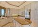 Gourmet kitchen with granite countertops and stainless steel appliances at 435 L Ambiance Dr # L807, Longboat Key, FL 34228
