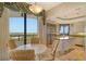 Open kitchen with stainless steel appliances, island and water view at 435 L Ambiance Dr # L807, Longboat Key, FL 34228