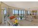 Open concept living space with panoramic views at 435 L Ambiance Dr # L807, Longboat Key, FL 34228