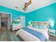 Bedroom features a ceiling fan and coastal decor, creating a relaxing and serene atmosphere at 4802 51St W St # 1811, Bradenton, FL 34210