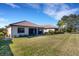 Well-maintained backyard with screened lanai is perfect for enjoying the outdoors at 8079 36Th Street E Cir, Sarasota, FL 34243
