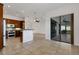 Open-concept kitchen featuring granite countertops and stainless steel appliances at 8079 36Th Street E Cir, Sarasota, FL 34243