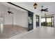 Inviting screened-in lanai featuring sliding doors leading to the home's interior spaces and a beautiful outdoor view at 8079 36Th Street E Cir, Sarasota, FL 34243