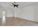 Open-plan living room featuring tile flooring and plenty of space at 8079 36Th Street E Cir, Sarasota, FL 34243