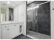 Modern bathroom with a glass-enclosed shower and a vanity at 8134 Coates Row Pl, Bradenton, FL 34201