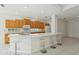 Spacious kitchen with a large island, modern appliances, and plenty of cabinet space at 8134 Coates Row Pl, Bradenton, FL 34201