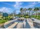 Inviting community park featuring paved walkways, lush greenery, and a shaded gazebo area at 1206 2Nd E Ave, Bradenton, FL 34208