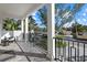 Relaxing porch with tiled floor, railing and exterior home view at 1525 Mallard Ln, Sarasota, FL 34239