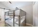 Bedroom with bunkbeds, barn door and ample space at 2211 Avenue C, Bradenton Beach, FL 34217
